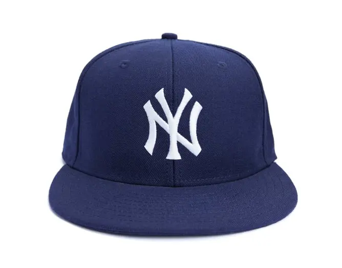 Taipei, Taiwan – December 17, 2012: This is a studio shot of blue New York Yankees hat made by New Era isolated on a white background.